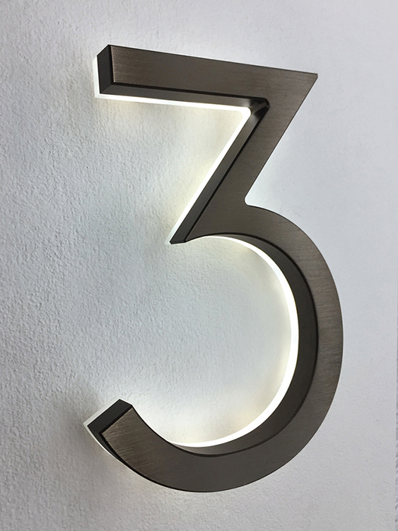 Modern neutra 8" bronze backlit numbers by Luxello LED Signage Modern neutra 8" bronze backlit numbers by Luxello LED Signage
